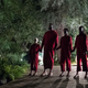 Four people in red standing in your driveway is not cool.